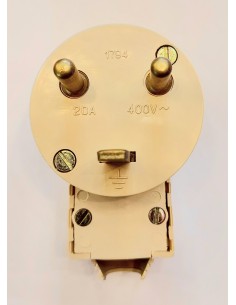 Clavija bipolar 20a toma de tierra con salida acodada marfil